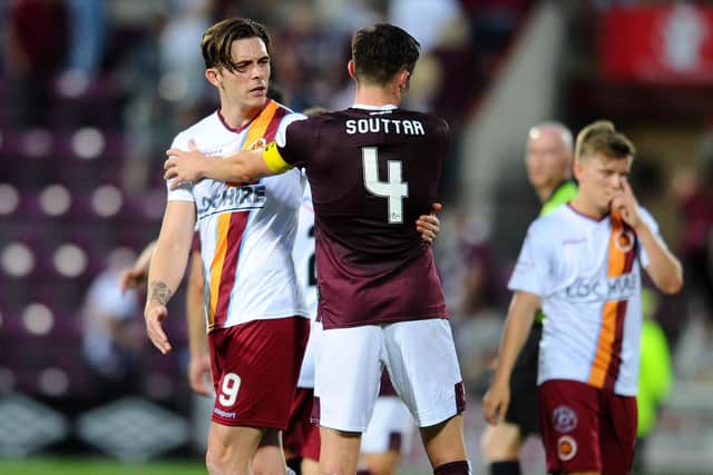 Stenhousemuir and Hearts players embrace after the League 2 side met the Premiership outfit in a Betfred Cup tie at Tynecastle last July. Picture Michael Gillen.