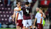 Stenhousemuir and Hearts players embrace after the League 2 side met the Premiership outfit in a Betfred Cup tie at Tynecastle last July. Picture Michael Gillen.