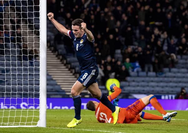 John McGinn celebrates after scoring his second goal to seal Scotland’s 3-1 victory over Kazakhstan in their final group qualifying match. Picture: SNS