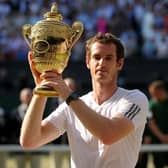 Andy Murray with the trophy after beating Serbia's Novak Djokovic to win the men's singles at Wimbledon in 2013. Picture: Adam Davy/PA Wire