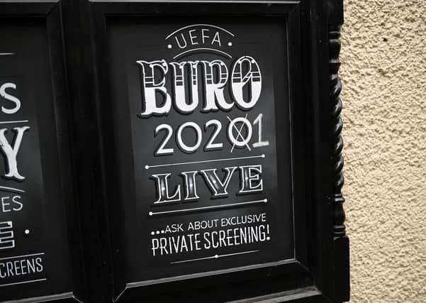 A sign at a closed-down pub in York advertising the postponed Uefa European Championships, which will now take place in 2021. Picture: Oli Scarff/AFP/Getty