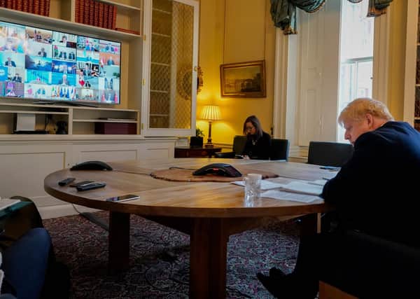 Boris Johnson wore a suit for this video conference call with other G20 leaders, but other people have taken a more relaxed approach to the dress code (Picture: Andrew Parsons/10 Downing Street/AFP via Getty Images)