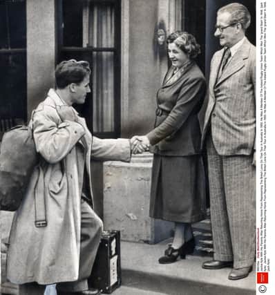 The great Irish fly-half Jack Kyle is greeted by his parents on his return from the 1950 Lions tour. Picture: Daily Mail/Shutterstock