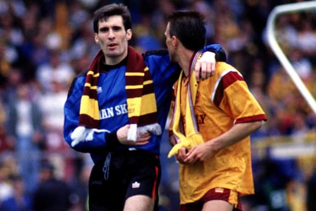 Injured Motherwell goalkeeper Ally Maxwell (left) with defender Luc Nijholt following their Scottish Cup triumph. Picture: SNS.