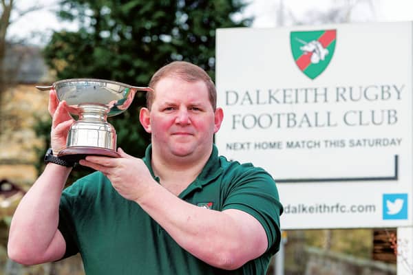 Steven Halliday, president of Dalkieth Rugby Club, has already got his hands on the silverware. Picture: Ian Georgeson