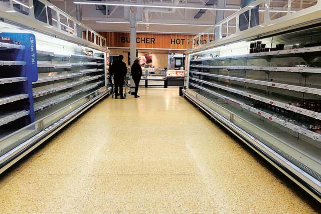 Empty shelves at Sainsbury's in Blackhall, Edinburgh. Panic buyers have stripped the supermarket shelves of food, soap and toilet rolls as fears rise over the spread of the Coronavirus
