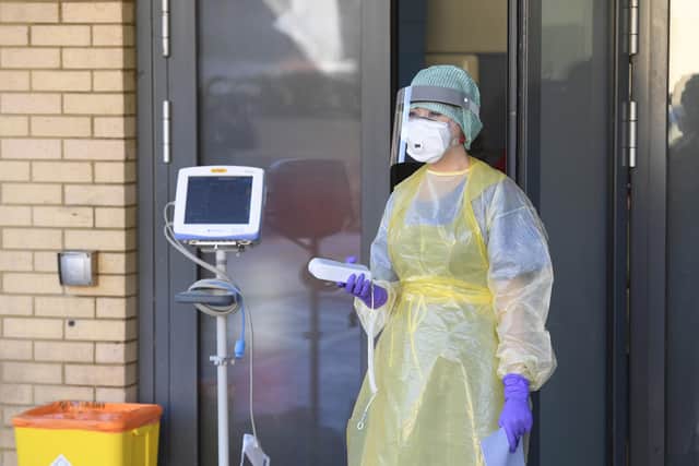 An emergency department Nurse during a demonstration of the Coronavirus pod and Covid-19 virus testing procedures. Picture: Michael Cooper/PA Wire