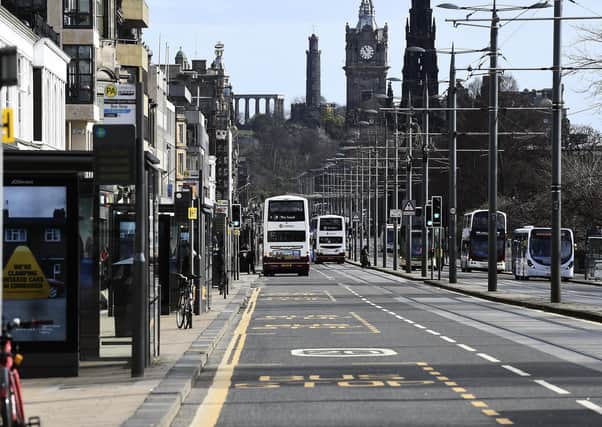 Not a soul can be seen in this picture of Edinburgh's Princes Street (Picture: Lisa Ferguson)