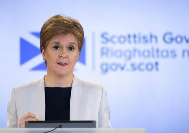 Nicola Sturgeon said she would back a plan to pay tribute to NHS staff who have lost their lives