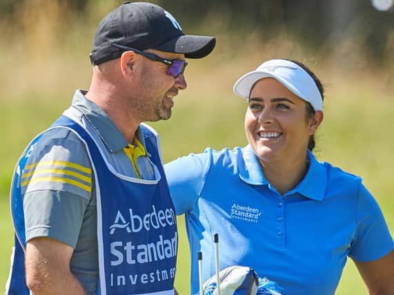 Kelsey MacDonald, pictured talking to caddie Tim Poyser in last year's Aberdeen Standard Investments Ladies Scottish Open, recorded her best LET performance in the last event on the circuit before it was shutdown by the virus. Picture: Aberdeen Standard Investments