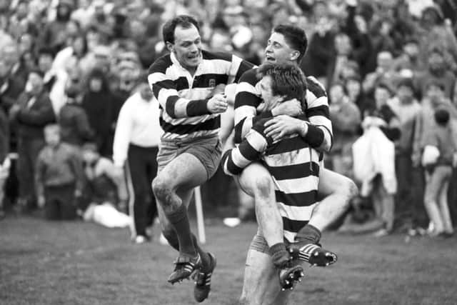 Andrew Ker, Alan Tait and Eric Paxton celebrate Kelso's victory over Jed-Forest in the final of the 1988 Melrose Sevens. Picture: Alan Macdonald
