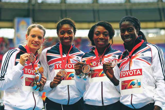 Eilidh Child, left, and her team-mates Christine Ohuruogu, Shana Cox and Margaret Adeoye receive their bronze medals after the 4x400m relay at the 2013 World Championships in Moscow. Picture: Paul Gilham/Getty Images)