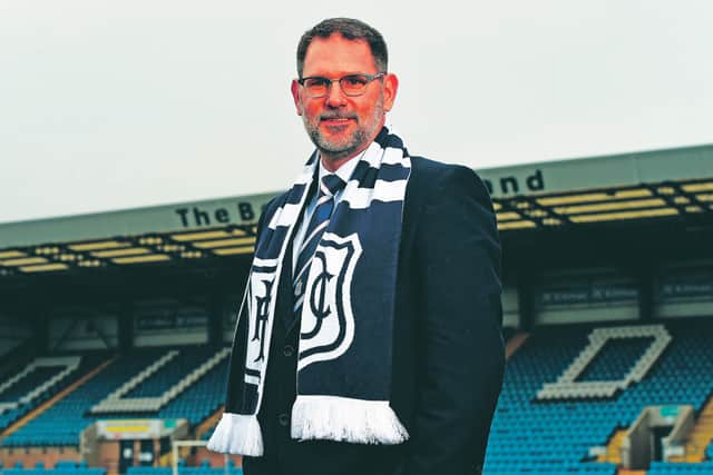 Baffled supporters have now seen the voting slip signed by Dundee managing director John Nelms. Photograph: Ross MacDonald/SNS