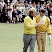 Jack Nicklaus consoles Doug Sanders after missing a short putt to win the 1970 Open at St Andrews. Nicklaus beat Sanders in an 18-hole play-off the following day