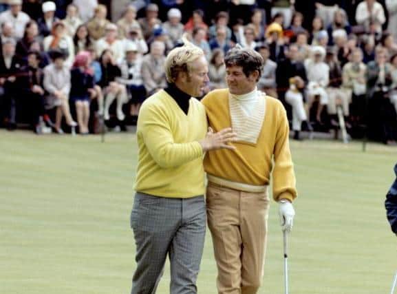 Jack Nicklaus consoles Doug Sanders after missing a short putt to win the 1970 Open at St Andrews. Nicklaus beat Sanders in an 18-hole play-off the following day