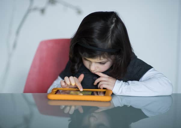 Children can sometimes seem addicted to a mobile phone but such technology has become a vital tool in the modern world, particularly during lockdown (Picture: John Devlin)