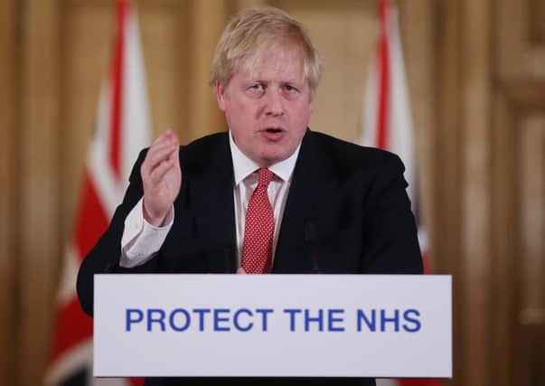 Boris Johnson speaking at the March 22 daily briefing