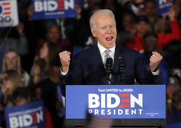 Joe Biden must beat Donald Trump to save democracy in the US (Picture: Gerald Herbert/AP)