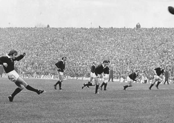 Dougie Morgan – former Scotland captain and British Lion, who died just two weeks ago – kicks one of his three penalties as the Scots beat Wales 12-10 in front of 104,000 fans, a world record crowd that would stand until 1999. Picture: DC Thomson