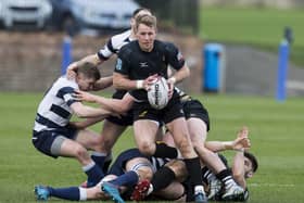 Currie stalwart Gregor Hunter, centre, has been praised by president Phil Thomas for his commitment to the Malleny Park club. Picture: Bruce White/SNS