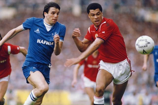 Graeme Sharp vies for possession with Manchester United's Paul McGrath during the 1985 FA Cup final. Picture: Getty.