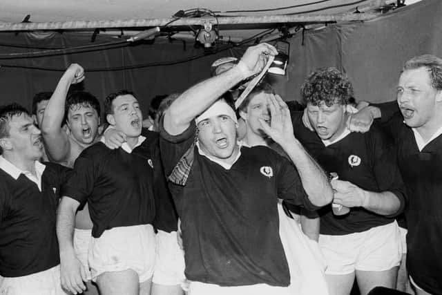 Captain David Sole and his players, top, celebrate their victory over England to seal the Grand Slam in 1990. Picture: PA