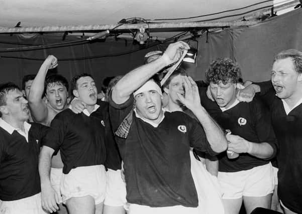 Captain David Sole and his players, top, celebrate their victory over England to seal the Grand Slam in 1990. Picture: PA