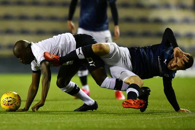 Morgaro Gomis, left, and Ross Matthews tussle during champions Raith Rovers’ 1-1 draw with Falkirk last month. Picture: Michael Gillen