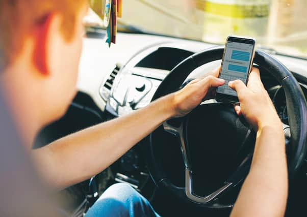 More men were penalised for driving while using a mobile phone