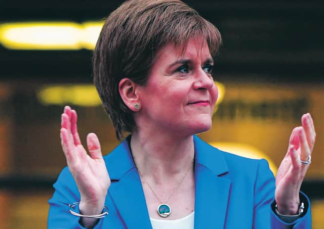 Scotland's First Minister Nicola Sturgeon takes part in a national "clap for carers" to show thanks for the work of the NHS. Picture: Getty