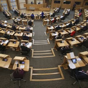 MSPs social distancing with every second seat removed at the Scottish Parliament, Holyrood, in Edinburgh. Picture: Fraser Bremner/PA Wire