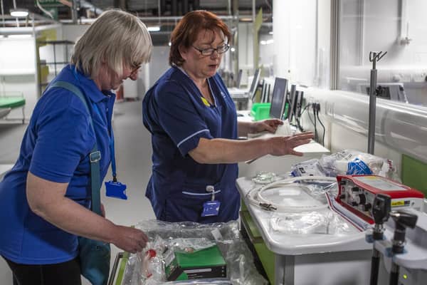 Nurses make final preparations during the completion of the construction of the NHS Louisa Jordan hospital in Glasgow. Picture: Jane Barlow