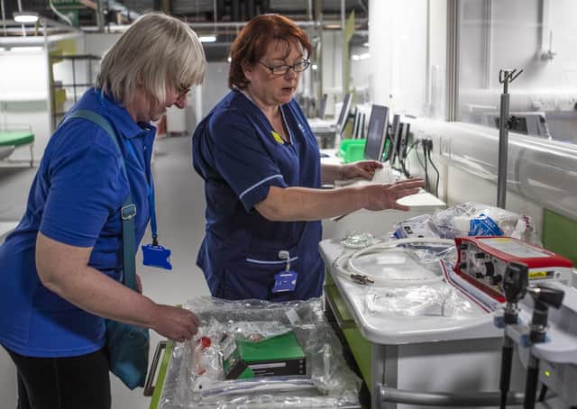 Nurses make final preparations during the completion of the construction of the NHS Louisa Jordan hospital in Glasgow. Picture: Jane Barlow
