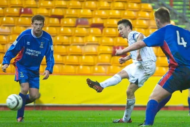Barry Nicholson slots the ball past Caley keeper Mark Brown. Picture: Jeff Holmes/SNS