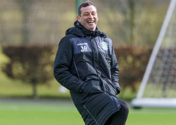 Hibs trained as normal at East Mains yesterday, but Jack Ross won’t gripe if matches are called off. Picture: SNS.