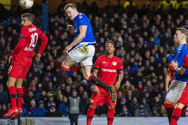 Rangers defender George Edmundson heads home to make it 2-1 after conceding apenalty following a VAR ruling. Picture: Craig Williamson/SNS