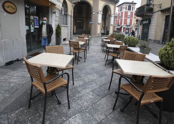 A deserted cafe in Codogno in Italy's Lombardy region (Picture: Antonio Calanni)