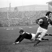 Gerald Davies jinks past Ian Smith to score a try in his country’s thrilling 19-18 win over Scotland at Murrayfield in February 1971