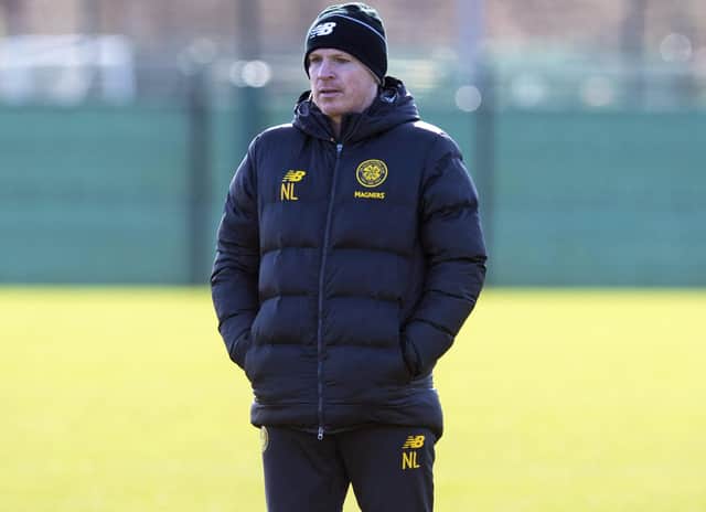 Celtic manager Neil Lennon watches training yesterday in preparation for tomorrow's Premiership clash with Rangers, but the match has been postponed. Picture: Paul Devlin/SNS