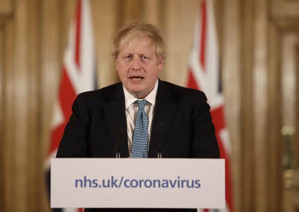 Boris Johnson and Chancellor Rishi Sunak have announced a major new package of measures designed to keep businesses afloat as people avoid going out because of the coronavirus outbreak (Picture: Matt Dunham/PA Wire)