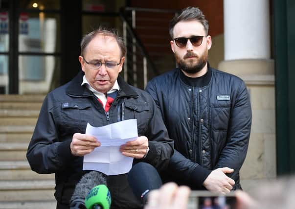 Paul Hett, father of Manchester Arena attack victim Martyn Hett, (with Martyn's brother Matt, right)  speaking outside Manchester Minshull Court. Picture: Jacob King/PA Wire