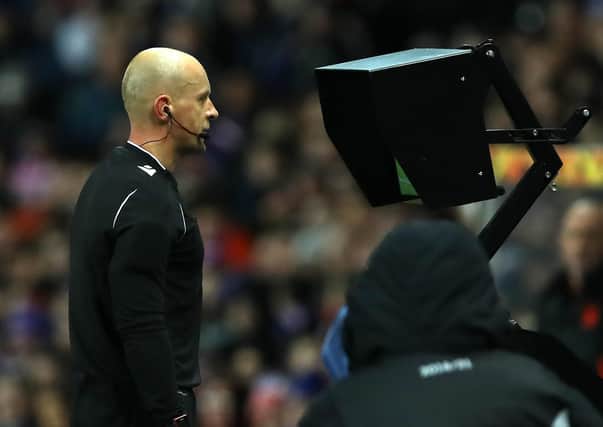 Polish ref Szymon Marciniak used VAR to award a penalty for Bayer Leverkusen against Rangers in the Europa League at Ibrox. Picture: Ian MacNicol/Getty