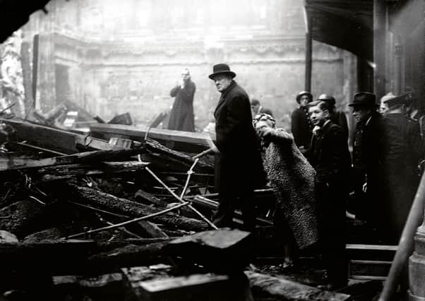 Winston Churchill and his wife Clementine inspect bomb damage in the City of London during the Blitz on 31 December, 1940. Picture: A Hampton/Topical Press Agency/Getty