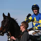 Galashiels jockey Ryan Mania steered outsider Aurora’s Encore to glory in the 2013 Grand National at Aintree. Picture: Julian Finney/Getty