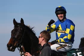 Galashiels jockey Ryan Mania steered outsider Aurora’s Encore to glory in the 2013 Grand National at Aintree. Picture: Julian Finney/Getty
