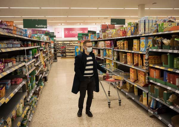 Supermarkets have been taking special measures to ensure supplies of food and other products because of stockpiling (Picture: Oli Scarff/AFP via Getty Images)