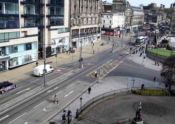 Pic Lisa Ferguson 17/03/2020

Edinburgh centre city today is almost a ghost city, 

princes street, frederick street, tourist buses, empty buses, empty tourist bus, hanover street, waverly bridge, waverly station, masks, tourists, trams, emoty pavements, empty streets, royal mille, high street, castle street, hand sanitsier, busy shos, ques