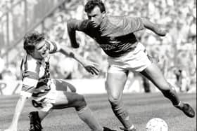 Rangers winger Davie Cooper bamboozles Celtic's Roy Aitken during an Old Firm clash in 1989. Picture: Brian Stewart