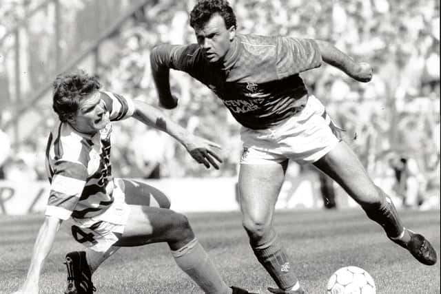 Rangers winger Davie Cooper bamboozles Celtic's Roy Aitken during an Old Firm clash in 1989. Picture: Brian Stewart