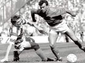 Rangers winger Davie Cooper bamboozles Celtic's Roy Aitken during an Old Firm clash in 1989. Picture: Brian Stewart